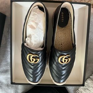 Gucci women’s loafers, new and never worn with original bag and box.